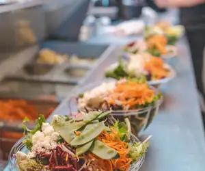 Fresh salads lined up in a row